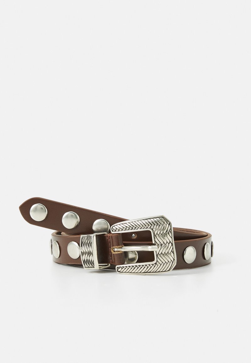 Brown leather belt featuring a decorative silver buckle with a herringbone pattern and large metal studs along the strap.