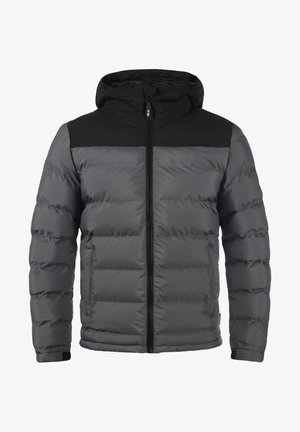 Giacca trapuntata con cappuccio nero e parte superiore nera, corpo grigio e zip frontale. Caratterizzata da polsini elastici e tasche laterali.