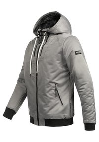 Gray puffer jacket with a hood, black lining, front zip pockets, and contrasting black cuffs and hem. Features white drawstrings.