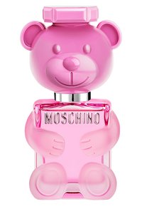 Różowa butelka perfum w kształcie misia z błyszczącym wykończeniem. Posiada srebrny obrzeże oraz wytłoczone "MOSCHINO" z przodu. Kwadratowy kształt korka.