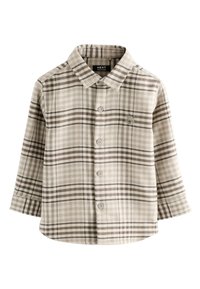 Camicia a quadri beige e marrone, realizzata in tessuto morbido. Presenta un colletto, maniche lunghe e un piccolo dettaglio logo.