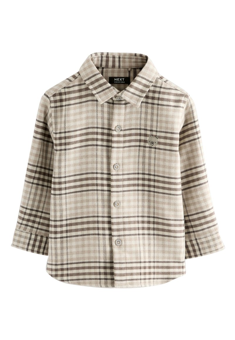 Camicia a quadri beige e marrone, realizzata in tessuto morbido. Presenta un colletto, maniche lunghe e un piccolo dettaglio logo.