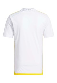 Vit kortärmad träningsskjorta med gula detaljer längs sidorna och kragen. Slät textur med en avslappnad passform.