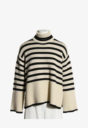 Pull col roulé rayé horizontal crème et noir avec poignets et ourlet côtelés, présenté sur un buste de mannequin blanc.