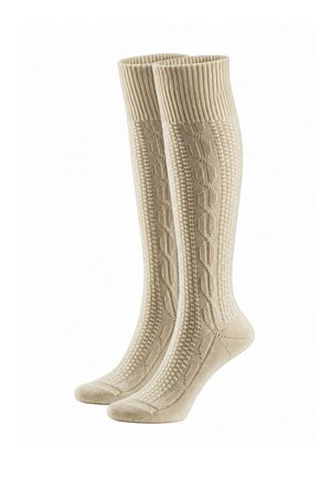 Pair of knee-high beige socks with a textured cable knit pattern and ribbed cuffs, displayed upright on a white background.