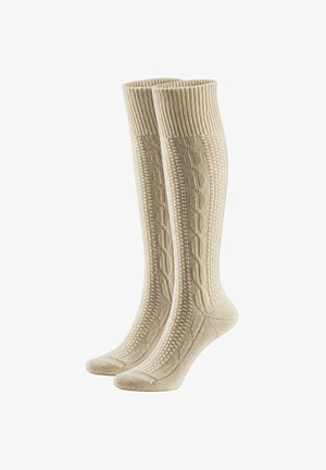 Pair of knee-high beige socks with a textured cable knit pattern and ribbed cuffs, displayed upright on a white background.