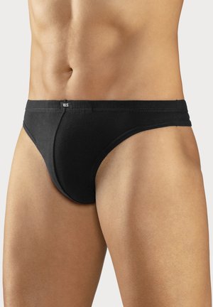 Schwarze Baumwollslips mit glatter Textur, enganliegendem Design und subtiler Logon auf dem Bund, die einen minimalistischen Stil präsentieren.