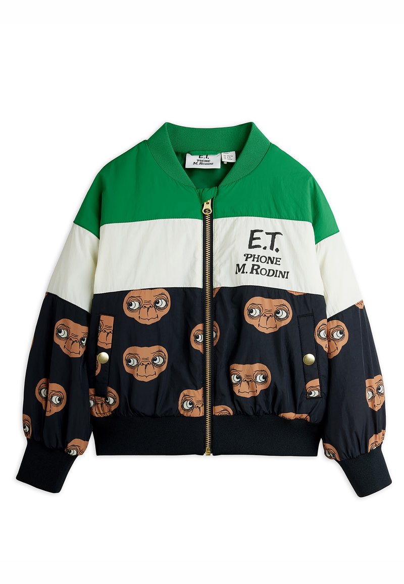 Παιδικό μπουφάν με φερμουάρ, πράσινο γιακά, λευκή κεντρική πάνελ με το κείμενο "E.T. PHONE M. RODINI" και μαύρη κάτω πλευρά που διαθέτει πρόσωπα του E.T.