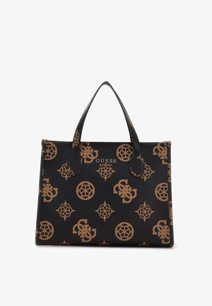 Czarna torba typu tote Guess z brązowymi wzorami monogramów i podwójnymi uchwytami, nazwa marki i rok założenia srebrnym drukiem na środku.