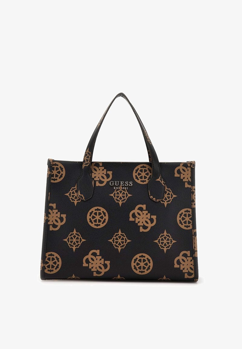 Sac cabas noir Guess avec motifs monogrammes marron et double poignée, nom de la marque et année de création en lettres argentées centrées.