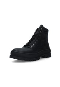 Stivali alla caviglia in pelle nera con lacci, dotati di una robusta suola in gomma, con occhielli metallici e una finitura liscia. Adatti per terreni rugged.