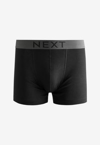 Black cotton boxer briefs with a gray elastic waistband featuring the word "NEXT" prominently displayed in black lettering.