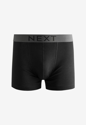Mustad puuvillased bokserpüksid musta värvi, hall elastne vöökoht, millel on silmatorkavalt mustade tähtedega sõna "NEXT".