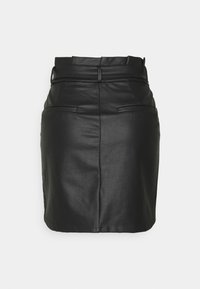 Black leather mini skirt with a fitted design, wide waistband, two front pockets, and a smooth texture. Subtle stitching detail on seams.