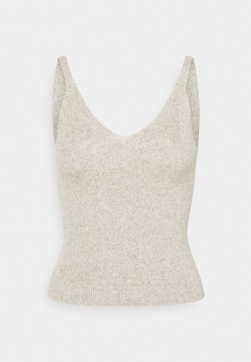 Haut en tricot beige sans manches avec un col en V et une texture côtelée, conçu pour une coupe ajustée.