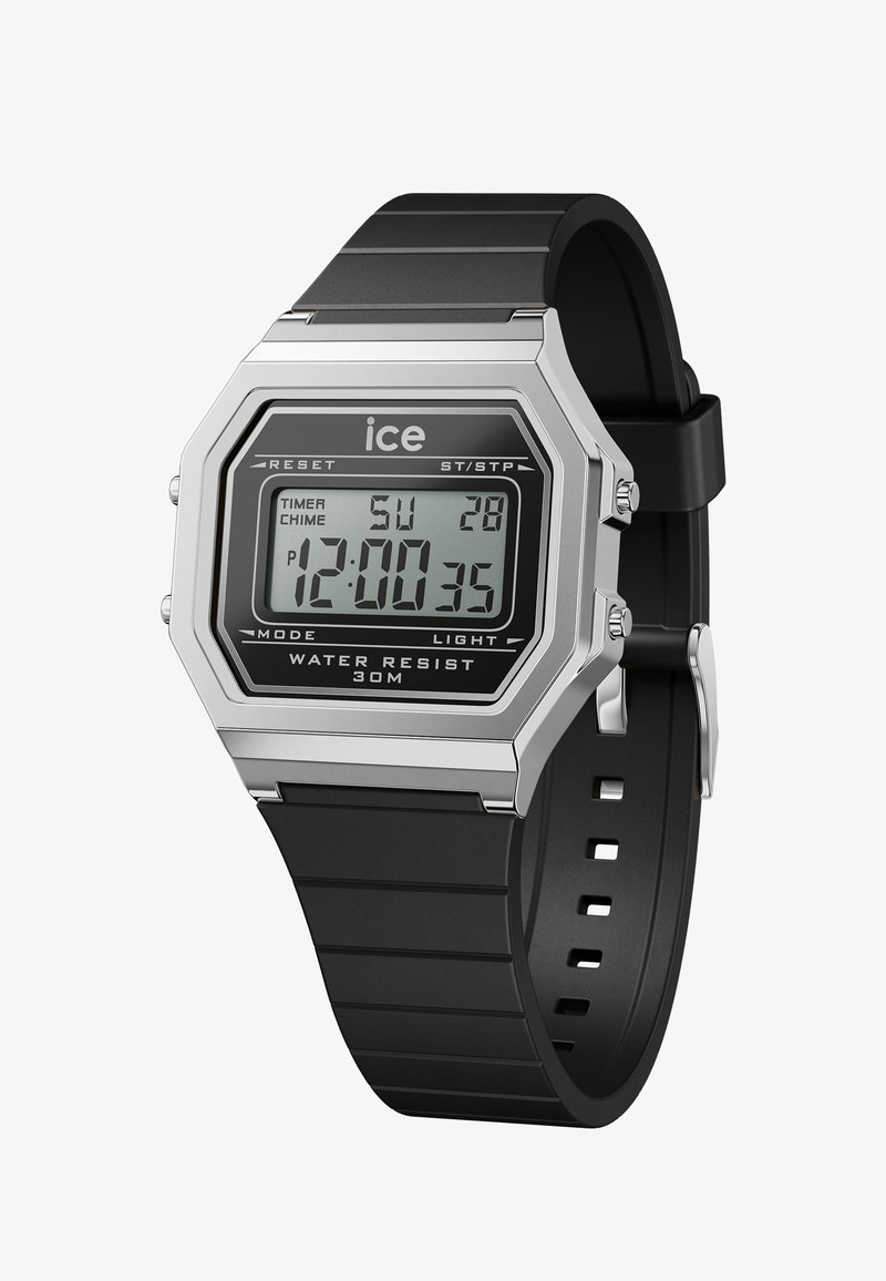 Zegarek cyfrowy z kopertą ze stali nierdzewnej w kolorze srebrnym, czarnym paskiem z gumy oraz wyświetlaczem cyfrowym pokazującym czas i datę. Wodoodporny do 30 m.