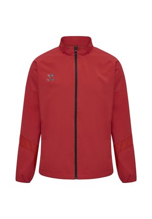 Rote Sportjacke mit durchgehendem Reißverschluss, Stehkragen, elastischen Bündchen und kleinem grauem Hummel-Logo auf der linken Brust.