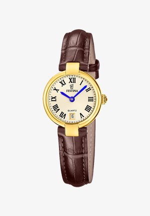 Reloj de pulsera redondo dorado con esfera crema, números romanos negros, manecillas azules, ventana de fecha y correa de cuero marrón oscuro.