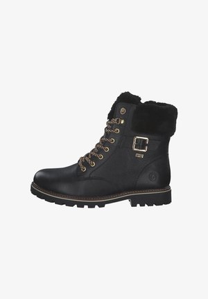 Bottine en cuir noir avec un col en fausse fourrure, quincaillerie dorée et lacets marron. Semelle à profil pour une meilleure adhérence ; finition texturée sur le dessus.