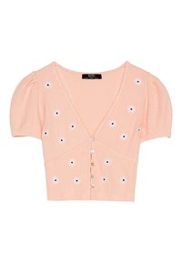 Haut à manches courtes couleur pêche avec un col en V, texture côtelée verticale, broderie florale et cinq boutons sur le devant.