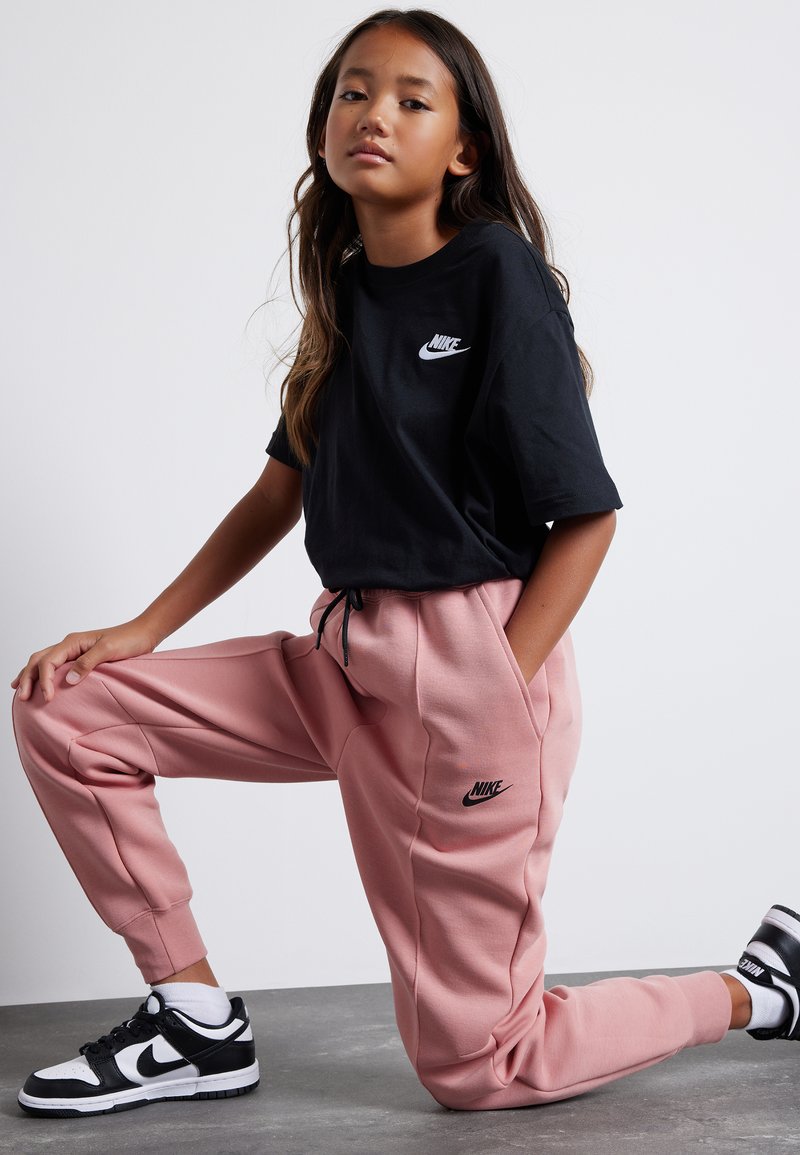 Nike Sportswear TECH FLEECE PANT Pantaloni de trening red stardust/black/roz Zalando.ro