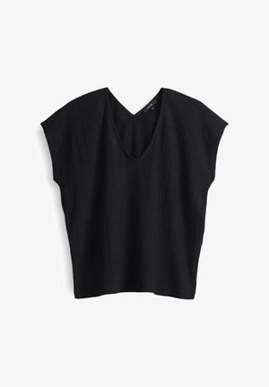 Schwarzes V-Ausschnitt-Top mit kurzen Flügelärmeln, aus strukturierter Baumwolle. Locker sitzendes Design mit entspannter Silhouette und rohem Saum.