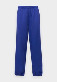 ORGANIC UNISEX - Tracksuit bottoms - bluing