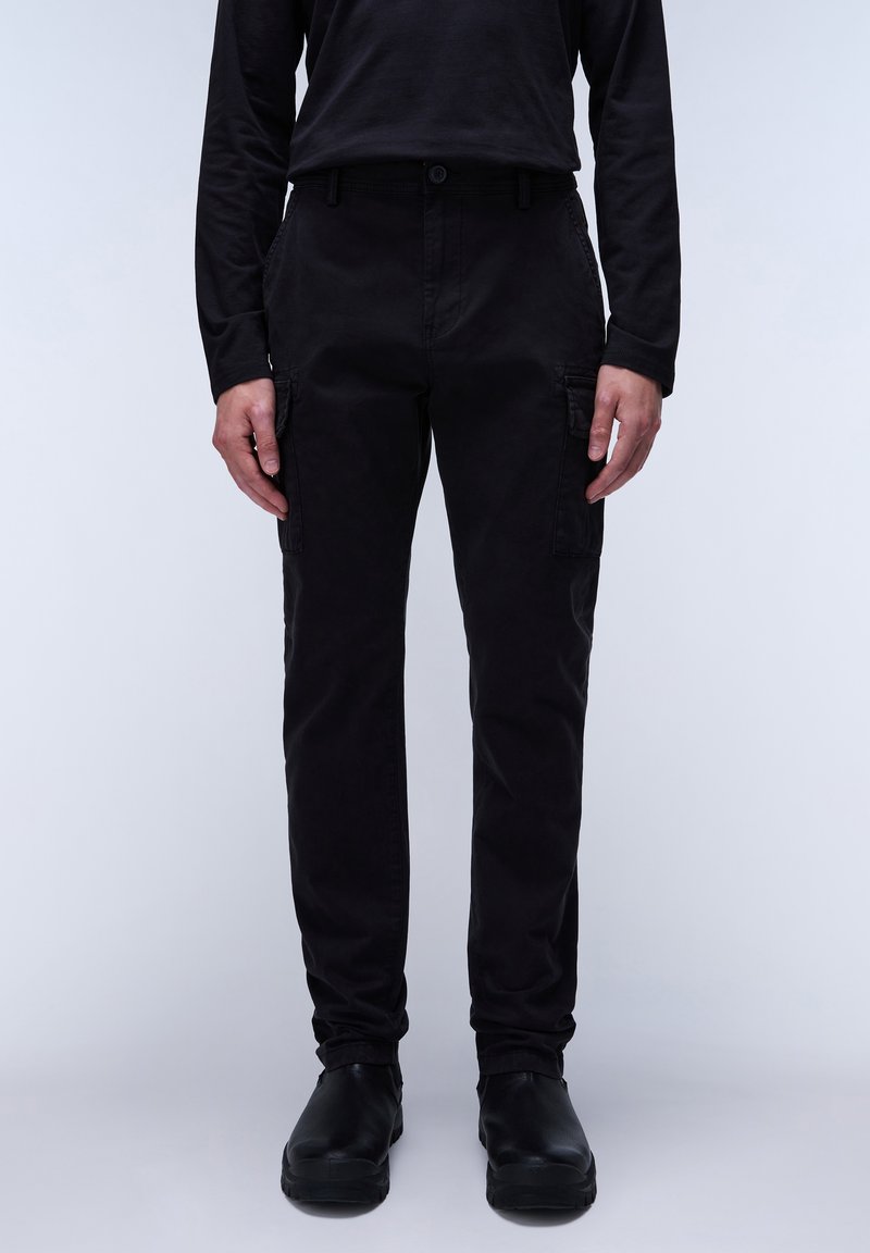 Black cargo pants with a straight cut, two side pockets, button closure, and a smooth texture, paired with black slip-on shoes.