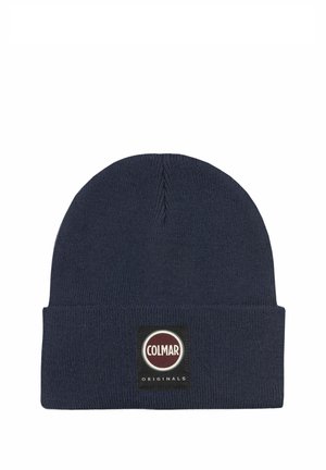 Tmavomodrá pletená čiapka s preloženým lemom a čiernou nášivkou so svojím kruhovým logom a slovom "COLMAR" v bielych písmenách.