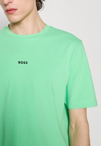 BOSS TCHUP - T-Shirt basic - open green