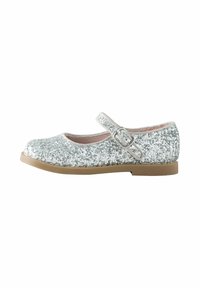 Scarpa Mary Jane con glitter argento, punta rotonda, cinturino con fibbia e suola in gomma marrone. Presenta un morbido rivestimento interno rosa.