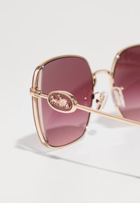 COACH Päikeseprillid - shiny rose gold/rose