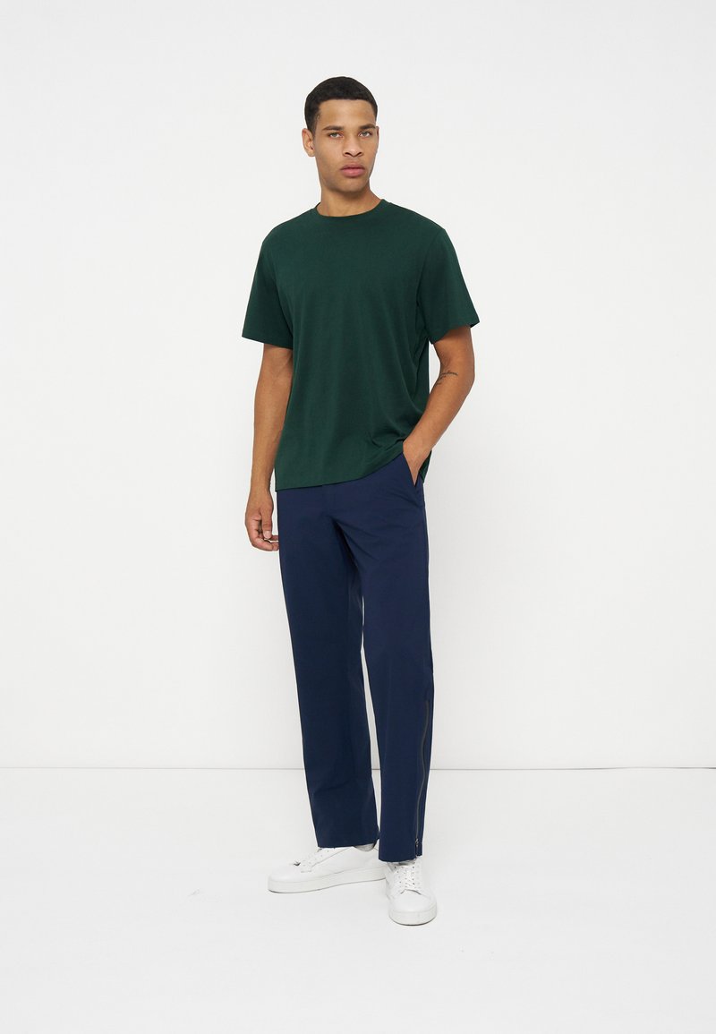 Pantalones montañeros largos