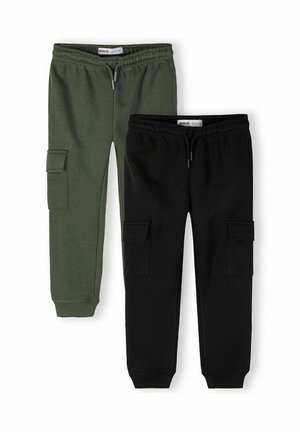 Dwie pary spodni dresowych typu cargo z troczkami i elastycznymi mankietami, jedna w kolorze oliwkowej zieleni, druga czarna, ułożone płasko na białym tle.