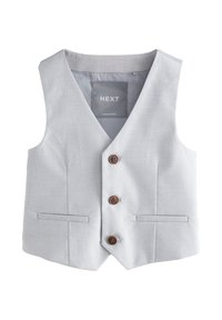 Chaleco gris claro con patrón de cuadros, que presenta un cuello en V, tres botones de madera y dos bolsillos laterales. Interior forrado con etiqueta de la marca.