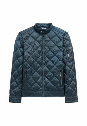 Ciemnoszara pikowana kurtka z przednim zamkiem błyskawicznym, kołnierzem zapinanym na zatrzask, dwoma kieszeniami na ręce na zamek oraz kieszenią na lewym rękawie z zamkiem i logo.