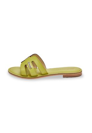 Lime green leather slide sandal with multiple cutouts, flat wooden sole, and smooth footbed. Detailed stitching along the edges.