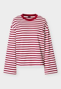 Κόκκινη και λευκή ριγέ μπλούζα με μακριά μανίκια και στρογγυλή λαιμόκοψη, φτιαγμένη από απαλό βαμβακερό ύφασμα. Διαθέτει φαρδιά μανίκια και χαλαρή γραμμή.