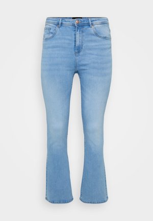 Ljusblå utsvängda jeans i bomullsdenim. Har hög midja, fem fickor och synlig sömnad längs sömmarna och fållen.