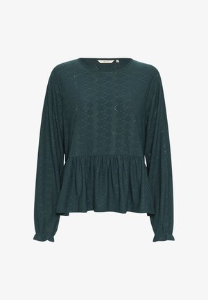 Tyrkysový dlouhý rukáv s kulatým výstřihem, zdobený krajkovými výřezovými vzory, s nařaseným peplum pasem a elastickými manžetami.