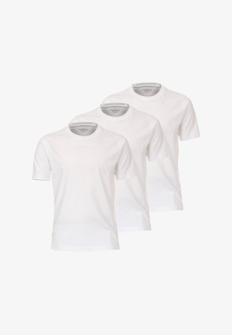 Drie eenvoudige witte katoenen T-shirts, met korte mouwen, ronde hals, voorzien van subtiele stikdetails rond de halslijn en mouwen.
