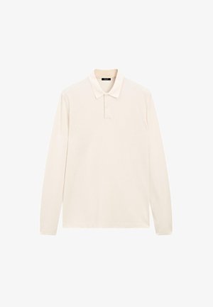 Polo a maniche lunghe beige con due bottoni e colletto, appoggiato su uno sfondo bianco.