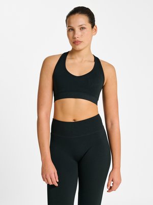 Hummel, HIIT SEAMLESS V SHAPE PADDED - High support sports bra - black