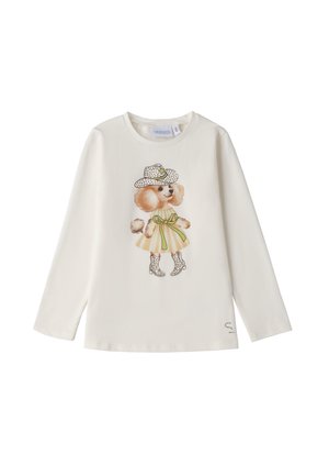 Camicia bianca di cotone a maniche lunghe con una grafica di un cane che indossa un cappello a pois, un vestito e stivali decorativi, con un accento in nastro verde.
