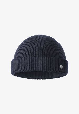 Knitted dark navy beanie with ribbed texture and a rolled cuff, featuring a small silver logo tag on the side.