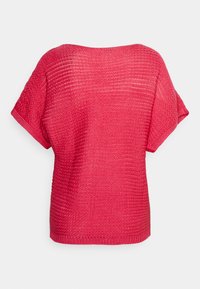 Suéter rosa de punto oversize con un ajuste holgado, mangas cortas anchas y patrón de rayas texturizado. Cuenta con un escote redondeado y dobladillo acanalado.