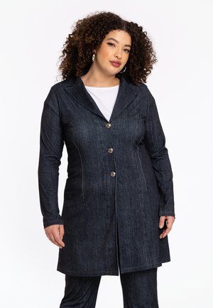 Denim blazer in dark blue with a tailored fit, single-button closure, and long sleeves. Features subtle stitching and a smooth texture.