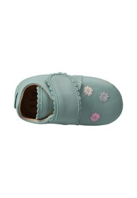 Soft leather shoe in mint green with a scalloped strap and floral embroidery in pink and white. Features a rounded toe and cushioned interior.