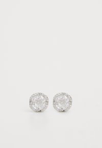 Round earrings with clear faceted central stones surrounded by a halo of small, sparkling accents. Metal setting is silver-colored.