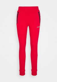Rode joggingbroek van zachte stof, voorzien van een elastische tailleband, twee ritszakken en geribbelde boorden bij de enkels.